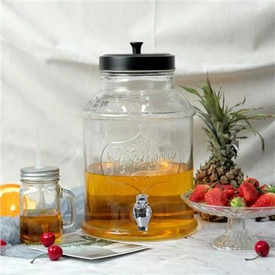 Distributeur de boissons en verre à jus transparent