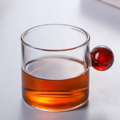 Tasse en verre à haute teneur en borosilicate avec poignée sphérique : soluti...